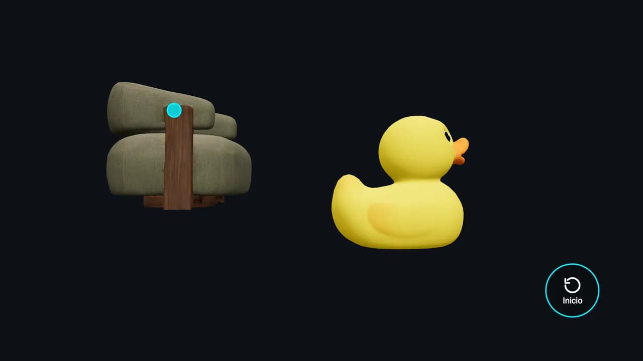 Objeto 3D con gestos: un sillón verde agarrado con el cursor de la mano, girado de costado, al lado de un pato de goma amarillo